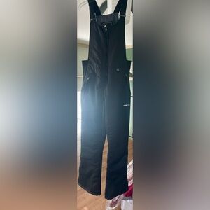 Arctix women’s black snow overall (S)